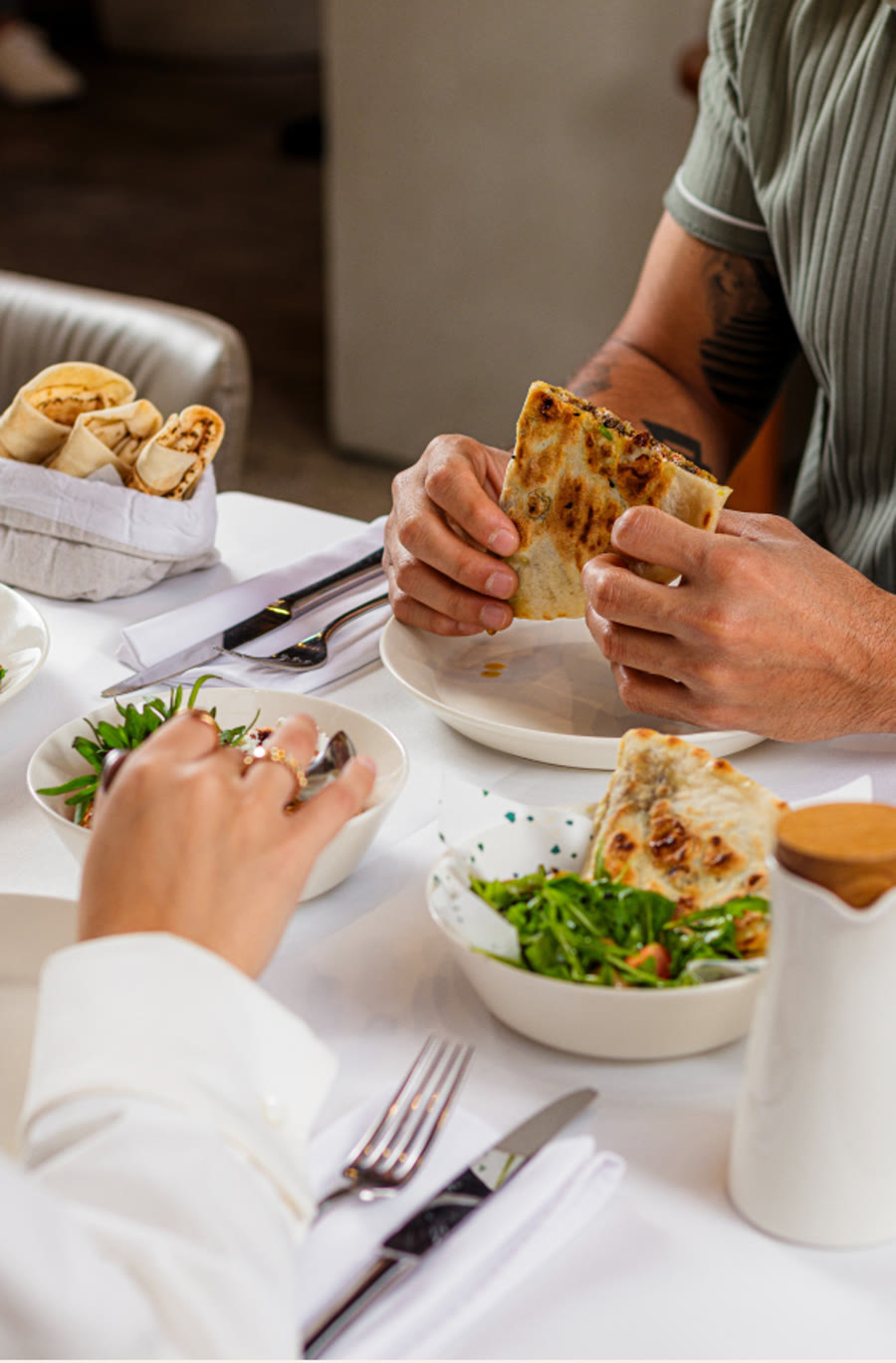 Guests enjoying Lebanese dishes at Maryool