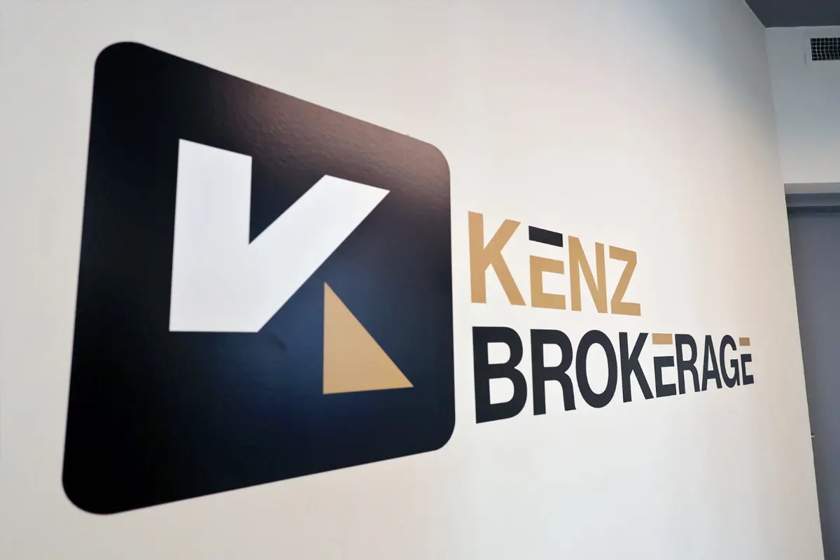 Kenz Brokerage office signage logo wall
