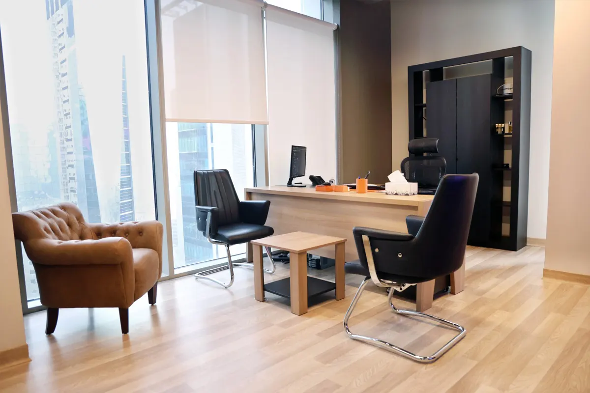 Kenz office space with modern furniture and city views